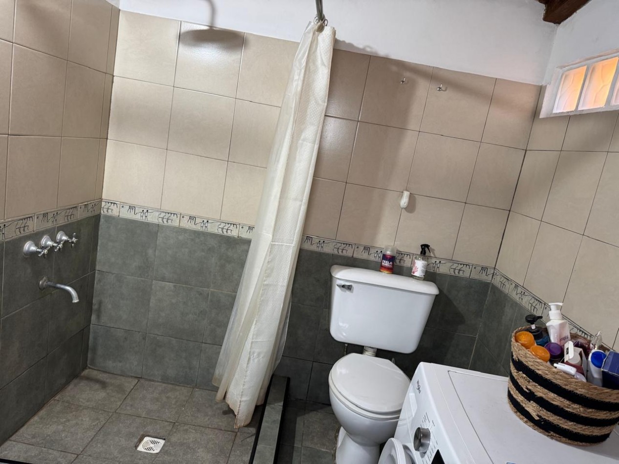 CASA TIPO CABAÑA DE 2 AMB CON PARQUE MAS DEPARTAMENTO EN BOSQUE PERALTA RAMOS. APTO CREDITO.